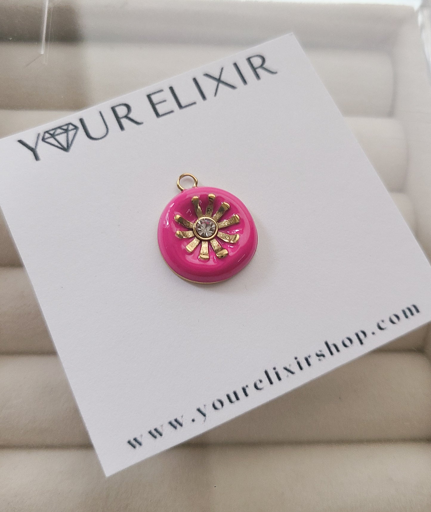 Charm de flor rosa dorada