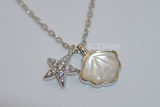 Collar de plata de ley con conchas de perla y estrellas de mar