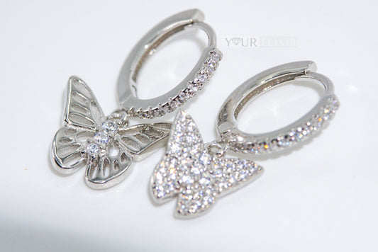 Mariposas brillantes en plata de ley