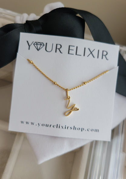 Colgante personalizado con inicial de oro