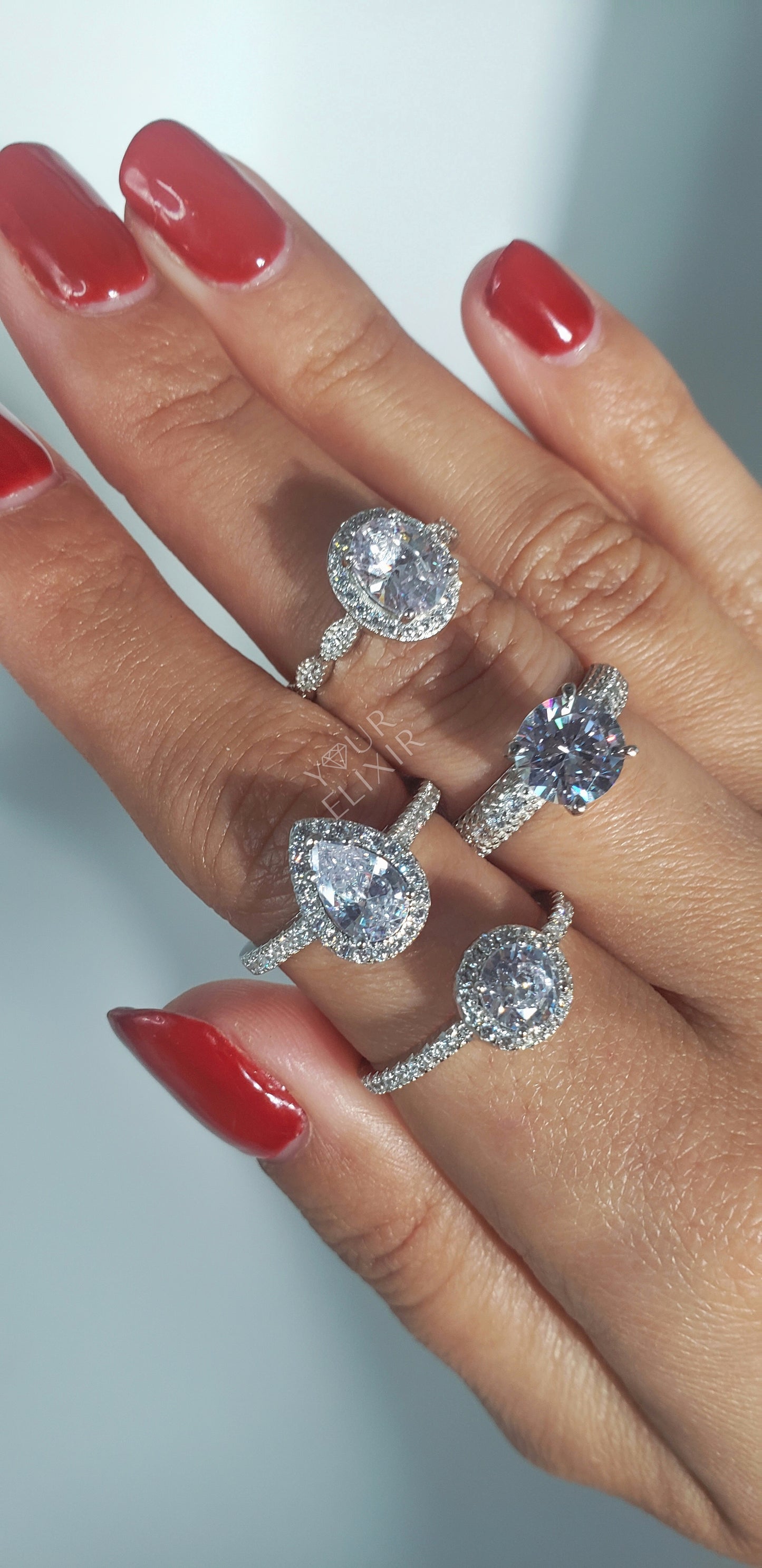 Anillo de plata de ley con halo en forma de lágrima